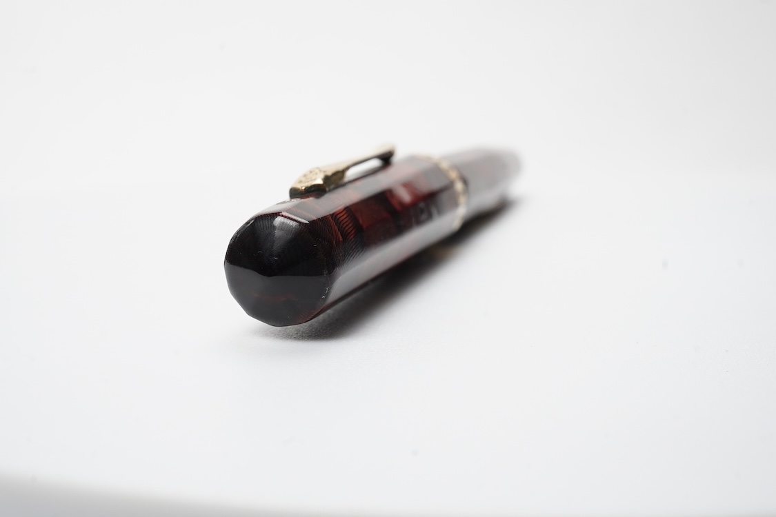 A Wahl Eversharp lever fill 'Doric' fountain pen in garnet colour with gold filled trim
